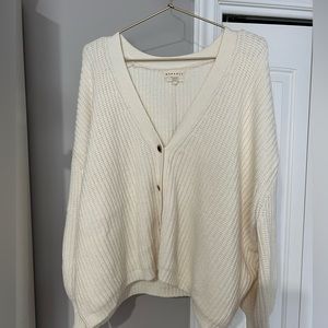 Cream cardigan with accent buttons, size large